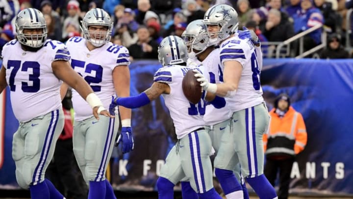 EAST RUTHERFORD, NEW JERSEY - DECEMBER 30: Blake Jarwin #89 of the Dallas Cowboys is congratulated by his teammates after his third quarter touchdown against the New York Giants at MetLife Stadium on December 30, 2018 in East Rutherford, New Jersey. (Photo by Steven Ryan/Getty Images)