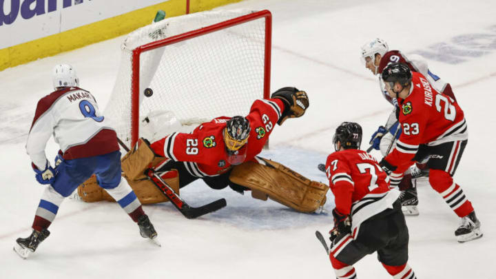 Jan 4, 2022; Chicago, Illinois, USA; Colorado Avalanche defenseman Cale Makar (8) scores the winning goal in overtime against the Chicago Blackhawks at United Center. Mandatory Credit: Kamil Krzaczynski-USA TODAY Sports
