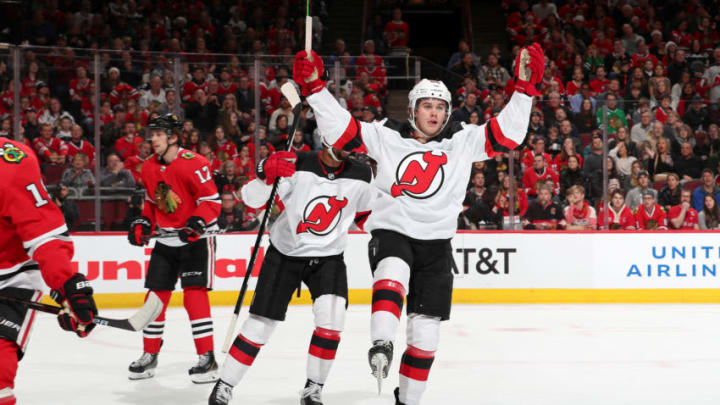 CHICAGO, IL - DECEMBER 23: Jack Hughes #86 of the New Jersey Devils reacts after scoring against the Chicago Blackhawks in the first period at the United Center on December 23, 2019 in Chicago, Illinois. (Photo by Chase Agnello-Dean/NHLI via Getty Images)