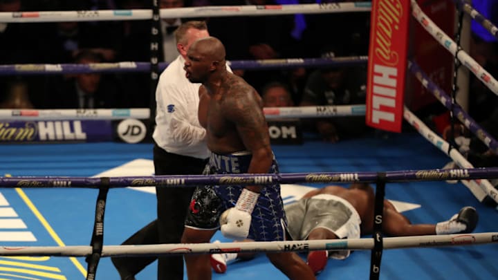 22nd December 2018, The O2 Arena, London, England; WBC Silver and WOB International Heavyweight Championship Boxing, Dillian Whyte versus Dereck Chisora; Dillian Whyte celebrates his KO win as Derek Chisora is unconscious on the canvas (photo by Shaun Brooks/Action Plus via Getty Images)