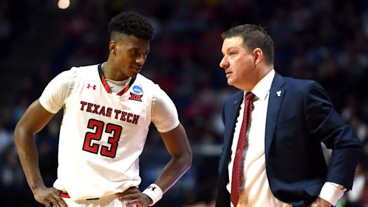 TULSA, OKLAHOMA - MARCH 24: Jarrett Culver #23 of the Texas Tech Red Raiders speaks with head coach Chris Beard during the second half of the second round game of the 2019 NCAA Men's Basketball Tournament against the Buffalo Bulls at BOK Center on March 24, 2019 in Tulsa, Oklahoma. (Photo by Stacy Revere/Getty Images)