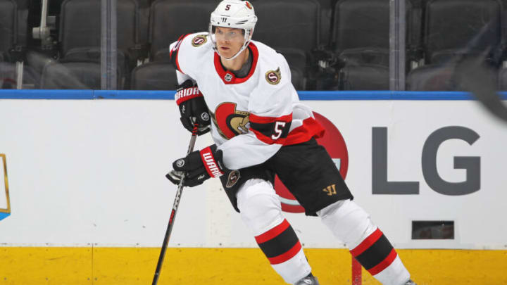 TORONTO, ON - JANUARY 1: Nick Holden #5 of the Ottawa Senators skates with the puck against the Toronto Maple Leafs during an NHL game at Scotiabank Arena on January 1, 2022 in Toronto, Ontario, Canada. The Maple Leafs defeated the Senators 6-0. (Photo by Claus Andersen/Getty Images)