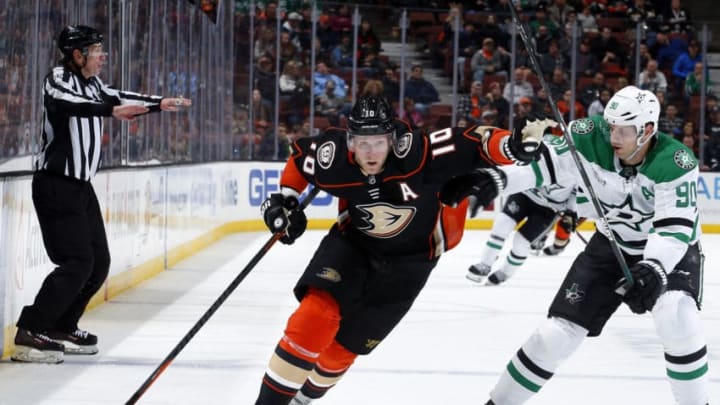 ANAHEIM, CA - FEBRUARY 21: Corey Perry #10 of the Anaheim Ducks skates with the puck against Jason Spezza #90 of the Dallas Stars during the game on February 21, 2018 at Honda Center in Anaheim, California. (Photo by Debora Robinson/NHLI via Getty Images)