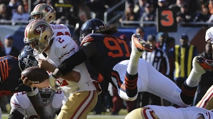 Dec 6, 2015; Chicago, IL, USA; Chicago Bears outside linebacker Willie Young (97) and Chicago Bears tight end Zach Miller (86) sack San Francisco 49ers quarterback Blaine Gabbert (2) in the first quarter of their game at Soldier Field. Mandatory Credit: Matt Marton-USA TODAY Sports