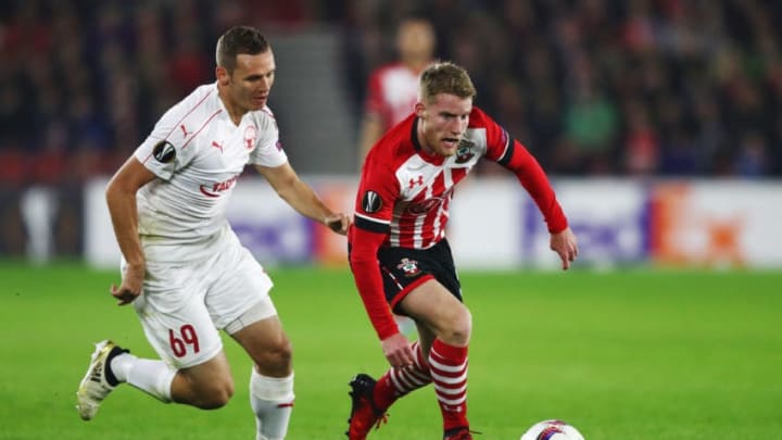 SOUTHAMPTON, ENGLAND – DECEMBER 08: Josh Sims of Southampton is chased by Mihaly Korhut of Hapoel Be’er Sheva during the UEFA Europa League Group K match between Southampton FC and Hapoel Be’er-Sheva FC at St Mary’s Stadium on December 8, 2016 in Southampton, England. (Photo by Clive Rose/Getty Images)