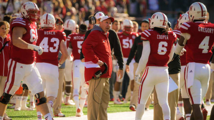 LINCOLN, NE - NOVEMBER 22: Nebraska Cornhuskers head coach Bo Pelini searches for an explanation from safety Corey Cooper #6 of the Nebraska Cornhuskers during their game against the Minnesota Golden Gophers at Memorial Stadium on November 22, 2014 in Lincoln, Nebraska. Minnesota defeated Nebraska 28-24. (Photo by Eric Francis/Getty Images)