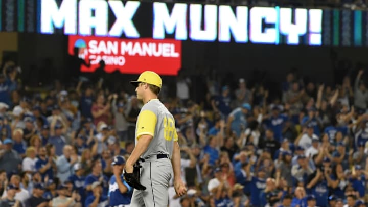 LOS ANGELES, CA - AUGUST 24: Phil Maton #88 of the San Diego Padres stands on the mound after giving up a two run home run to Max Muncy #13 of the Los Angeles Dodgers in the seventh inning at Dodger Stadium on August 24, 2018 in Los Angeles, California. Players are wearing special jerseys with their nicknames on them during Players' Weekend. (Photo by Jayne Kamin-Oncea/Getty Images)