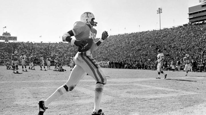 Tennessee wingback Lester McClain (85) runs through the back of the end zone after catching a 12-yard touchdown pass from Bobby Scott against Florida during the 25th annual Gator Bowl Dec. 27, 1969. A record crowd of 72,248 watch Florida upset the SEC champion Vols 14-13.69then12 055