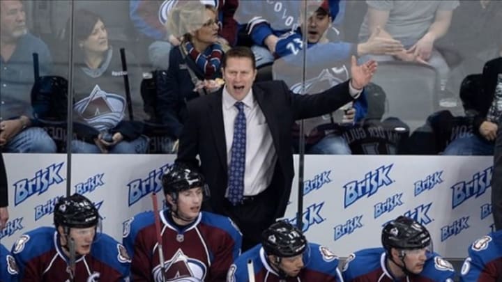 April 5 2013; Denver, CO, USA; Colorado Avalanche head coach Joe Sacco calls out from his bench during the first period of the game against the Detroit Red Wings at the Pepsi Center. Mandatory Credit: Ron Chenoy-USA TODAY Sports
