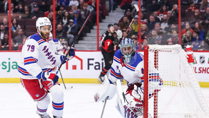 OTTAWA, CANADA - NOVEMBER 30: K'Andre Miller #79 of the New York Rangers and Jaroslav Halak #41 skate against the Ottawa Senators at Canadian Tire Centre on November 30, 2022 in Ottawa, Ontario, Canada. (Photo by Chris Tanouye/Freestyle Photography/Getty Images)