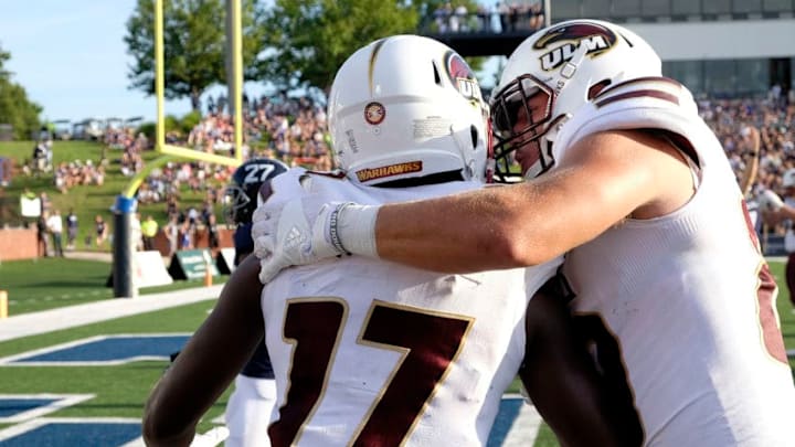 STATESBORO, GA - SEPTEMBER 17: Wide receiver Xavier Brown #17 of the Louisiana Monroe Warhawks is congratulated by tightend Alec Osborne #89 after scoring a touchdown against of the Georgia Southern Eagles in the first quarter on September 17, 2016 at Paulson Stadium in Statesboro, Georgia. (Photo by Todd Bennett/Getty Images)