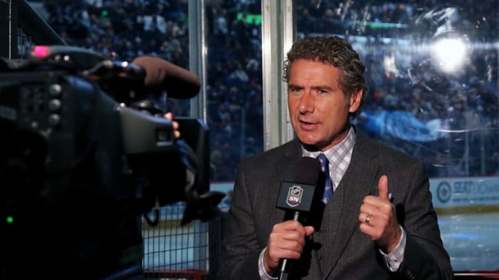 WINNIPEG, MB - DECEMBER 1: Sportsnet reporter Gene Principe does a live hit prior to puck drop in third period action between the Winnipeg Jets and Edmonton Oilers at the MTS Centre on December 1, 2016 in Winnipeg, Manitoba, Canada. (Photo by Jonathan Kozub/NHLI via Getty Images)