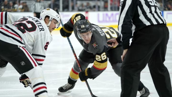 LAS VEGAS, NEVADA - NOVEMBER 13: Paul Stastny #26 of the Vegas Golden Knights faces off with Ryan Carpenter #22 of the Chicago Blackhawks during the second period at T-Mobile Arena on November 13, 2019 in Las Vegas, Nevada. (Photo by Jeff Bottari/NHLI via Getty Images)