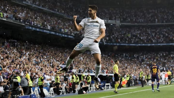 MADRID, SPAIN - AUGUST 16: Marco Asensio of Real Madrid CF celebrates scoring their opening goal during the Supercopa de Espana Final 2nd Leg match between Real Madrid and FC Barcelona at Estadio Santiago Bernabeu on August 16, 2017 in Madrid, Spain. (Photo by Gonzalo Arroyo Moreno/Getty Images)