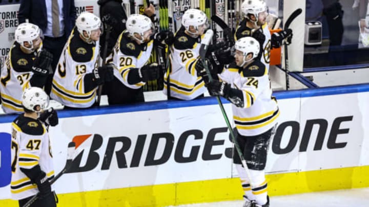 TORONTO, ONTARIO – AUGUST 17: Jake DeBrusk #74 of the Boston Bruins is congratulated by his teammates after scoring a goal against the Carolina Hurricanes during the third period in Game Four of the Eastern Conference First Round during the 2020 NHL Stanley Cup Playoffs at Scotiabank Arena on August 17, 2020 in Toronto, Ontario. (Photo by Elsa/Getty Images)