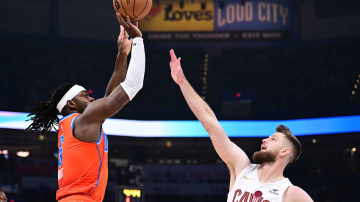 Shai Gilgeous-Alexander, Oklahoma City Thunder and Dean Wade, Cleveland Cavaliers. Photo by Joshua Gateley/Getty Images