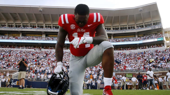 OXFORD, MS – SEPTEMBER 02: D.K. Metcalf #14 of the Mississippi Rebels prays before a game against the South Alabama Jaguars at Vaught-Hemingway Stadium on September 2, 2017 in Oxford, Mississippi. (Photo by Jonathan Bachman/Getty Images)