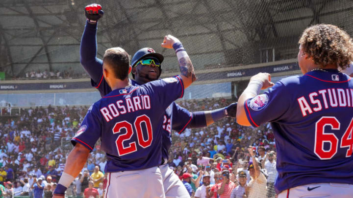 SANTO DOMINGO, DOM - MARCH 07: Miguel Sano #22 of the Minnesota Twins celebrates with Eddie Rosario #20 during a spring training game between the Minnesota Twins and the Detroit Tigers at Estadio Quisqueya Juan Marichal on March 7, 2020 in Santo Domingo, Dominican Republic. (Photo by Brace Hemmelgarn/Minnesota Twins/Getty Images)
