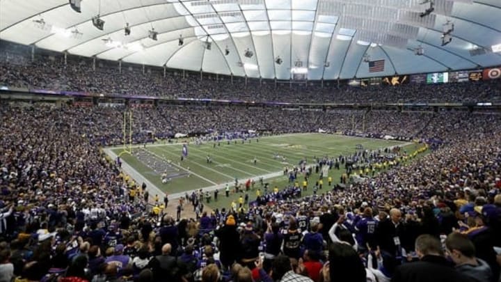 Dec 29, 2013; Minneapolis, MN, USA; A general view as members of the Minnesota Vikings celebrate a touchdown against the Detroit Lions in the fourth quarter at the last game at Mall of America Field at H.H.H. Metrodome. The Vikings win 14-13. Mandatory Credit: Bruce Kluckhohn-USA TODAY Sports