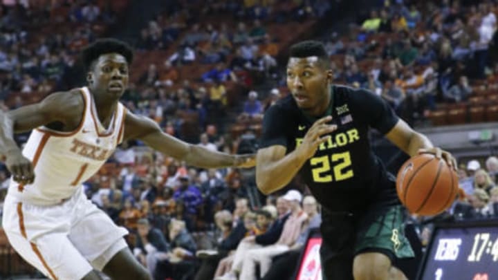 AUSTIN, TX – MARCH 4: King McClure #22 of the Baylor Bears drives around Andrew Jones #1 of the Texas Longhorns at the Frank Erwin Center on March 4, 2017 in Austin, Texas. (Photo by Chris Covatta/Getty Images)