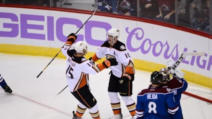 Nov 2, 2014; Denver, CO, USA; Anaheim Ducks right wing Corey Perry (10) cebrates his goal with center Ryan Getzlaf (15) in the first period against the Colorado Avalanche at Pepsi Center. Mandatory Credit: Ron Chenoy-USA TODAY Sports