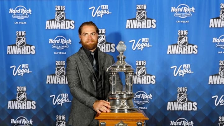 LAS VEGAS, NV - JUNE 22: Braden Holtby of the Washington Capitals poses after winning the Vezina Trophy named for the top goaltender at the 2016 NHL Awards at the Hard Rock Hotel LAS VEGAS, NV - JUNE 22: Braden Holtby of the Washington Capitals poses after winning the Vezina Trophy named for the top goaltender at the 2016 NHL Awards at the Hard Rock Hotel
