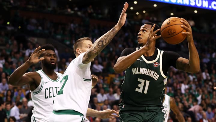 BOSTON, MA – OCTOBER 18: John Henson #31 of the Milwaukee Bucks looks for a shot over Daniel Theis #27 of the Boston Celtics during the second quarter at TD Garden on October 18, 2017 in Boston, Massachusetts. NOTE TO USER: User expressly acknowledges and agrees that, by downloading and or using this Photograph, user is consenting to the terms and conditions of the Getty Images License Agreement. (Photo by Maddie Meyer/Getty Images)