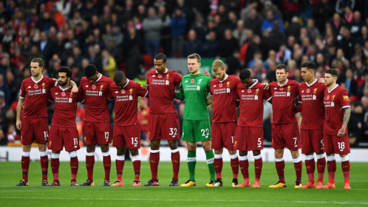 LIVERPOOL, UNITED KINGDOM - OCTOBER 28: The Liverpool team take part in minute of silence for remembrance day prior to the Premier League match between Liverpool and Huddersfield Town at Anfield on October 28, 2017 in Liverpool, England. (Photo by Gareth Copley/Getty Images)