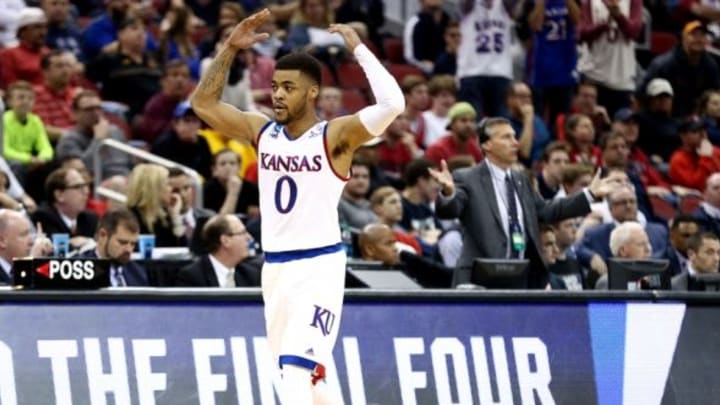 Mar 24, 2016; Louisville, KY, USA; Kansas Jayhawks guard Frank Mason III (0) celebrates during the second half against the Maryland Terrapins in a semifinal game in the South regional of the NCAA Tournament at KFC YUM!. Mandatory Credit: Aaron Doster-USA TODAY Sports