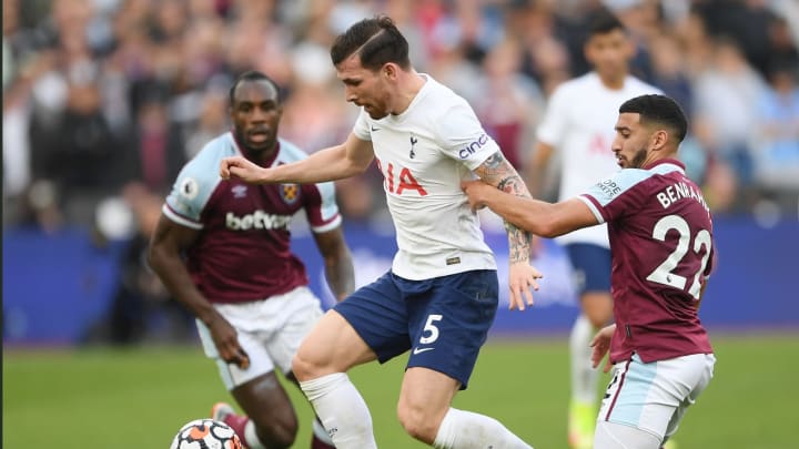 LONDON, ENGLAND - OCTOBER 24: Pierre-Emile Hojbjerg of Tottenham Hotspur is challenged by Said Benrahma of West Ham United during the Premier League match between West Ham United and Tottenham Hotspur at London Stadium on October 24, 2021 in London, England. (Photo by Harriet Lander/Copa/Getty Images)