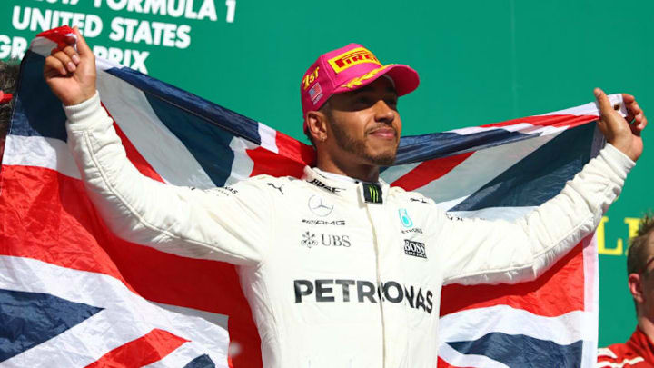 AUSTIN, TX - OCTOBER 22: Race winner Lewis Hamilton of Great Britain and Mercedes GP celebrates on the podium during the United States Formula One Grand Prix at Circuit of The Americas on October 22, 2017 in Austin, Texas. (Photo by Clive Rose/Getty Images)