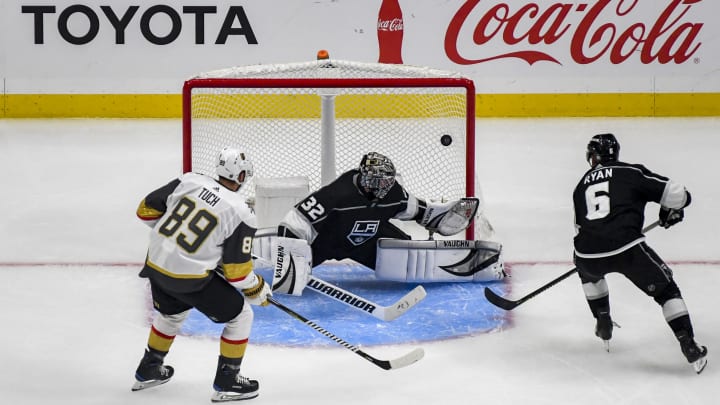 LOS ANGELES, CA – SEPTEMBER 19: Alex Tuch #89 of the Vegas Golden Knights and Joakim Ryan #6 of the Los Angeles Kings look on as Kings goaltender Jonathan Quick #32 attempts to make the save during the third period of the preseason game at STAPLES Center on September 19, 2019 in Los Angeles, California. (Photo by Juan Ocampo/NHLI via Getty Images)