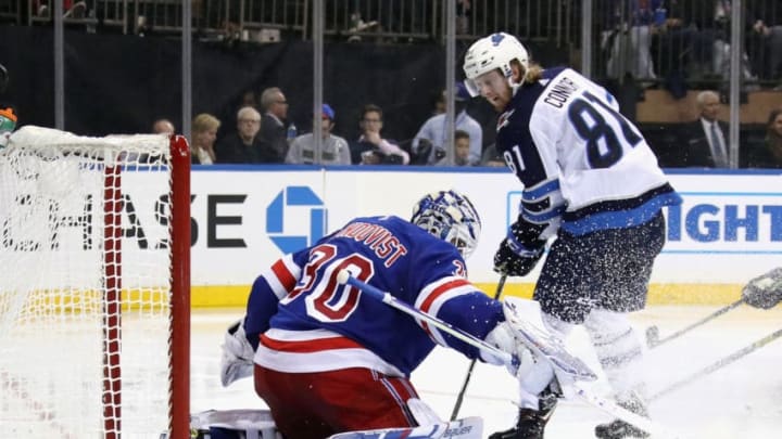NEW YORK, NEW YORK - OCTOBER 03: Henrik Lundqvist #30 makes the third period stop on Kyle Connor #81 of the Winnipeg Jets at Madison Square Garden on October 03, 2019 in New York City. The Rangers defeated the Jets 6-4. (Photo by Bruce Bennett/Getty Images)