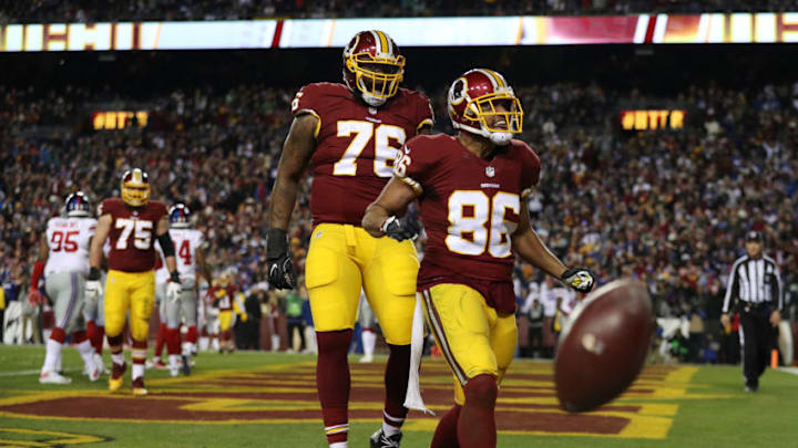 LANDOVER, MD - JANUARY 01: Tight end Jordan Reed #86 of the Washington Redskins celebrates with teammate tackle Morgan Moses #76 after scoring a fourth quarter touchdown against the New York Giants at FedExField on January 1, 2017 in Landover, Maryland. (Photo by Patrick Smith/Getty Images)