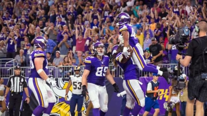 Sep 1, 2016; Minneapolis, MN, USA; Minnesota Vikings running back Jhurell Pressley (42) celebrates his touchdown in the second quarter against the Los Angeles Rams at U.S. Bank Stadium. Mandatory Credit: Brad Rempel-USA TODAY Sports