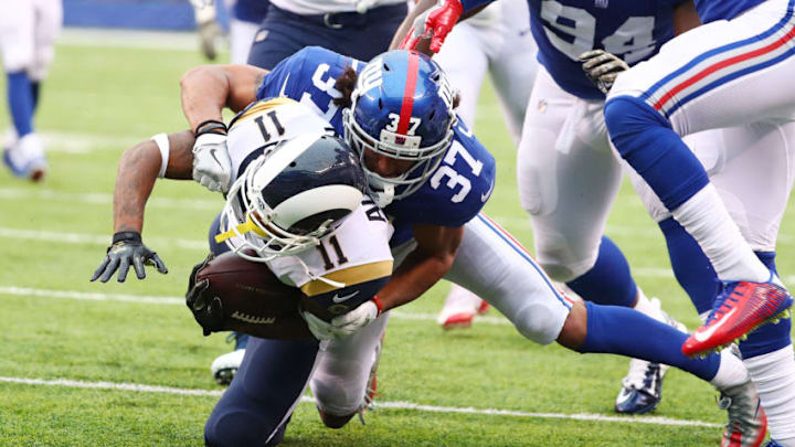 EAST RUTHERFORD, NJ - NOVEMBER 05: Tavon Austin #11 of the Los Angeles Rams completes a run as Ross Cockrell #37 of the New York Giants makes the tackle during their game at MetLife Stadium on November 5, 2017 in East Rutherford, New Jersey. (Photo by Al Bello/Getty Images)