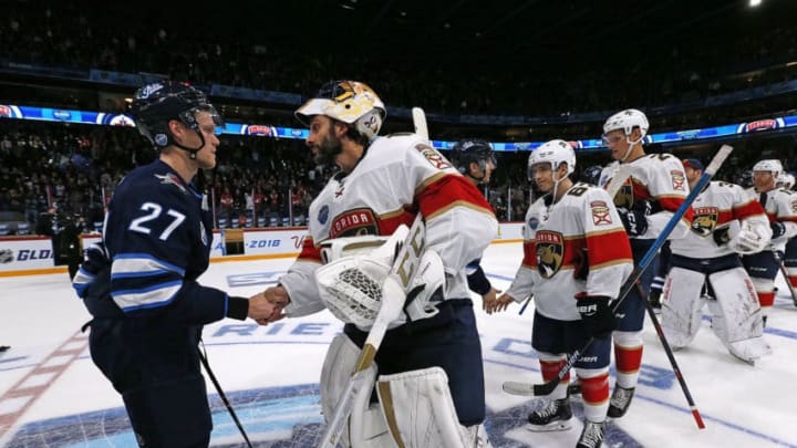 HELSINKI, FINLAND - NOVEMBER 2: Goaltender Roberto Luongo #1 of the Florida Panthers shakes hands with Nikolaj Ehlers #27 of the Winnipeg Jets after their 4-2 win in the 2018 NHL Global Series at the Hartwall Arena on November 2, 2018 in Helsinki, Finland. (Photo by Eliot J. Schechter/NHLI via Getty Images)