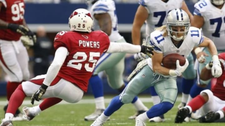 Nov 2, 2014; Arlington, TX, USA; Dallas Cowboys wide receiver Cole Beasley (11) in game action against Arizona Cardinals cornerback Jerraud Powers (25) at AT&T Stadium. Arizona beat Dallas 28-17. Mandatory Credit: Tim Heitman-USA TODAY Sports