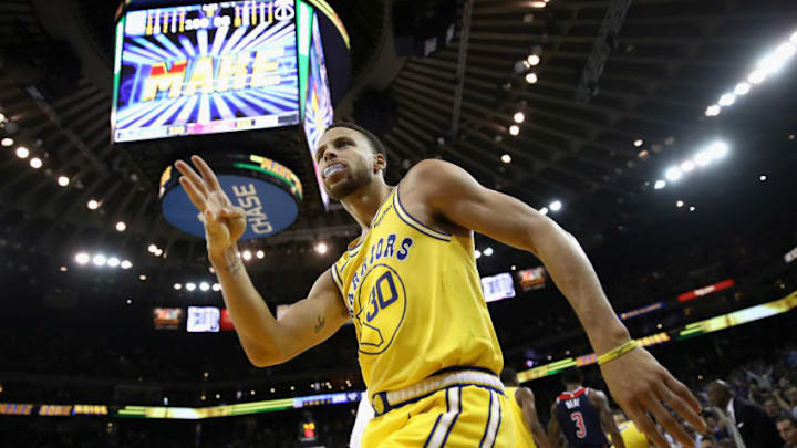 OAKLAND, CA - OCTOBER 24: Stephen Curry #30 of the Golden State Warriors reacts after he made a three-point basket and was fouled by the Washington Wizards at ORACLE Arena on October 24, 2018 in Oakland, California. NOTE TO USER: User expressly acknowledges and agrees that, by downloading and or using this photograph, User is consenting to the terms and conditions of the Getty Images License Agreement. (Photo by Ezra Shaw/Getty Images)