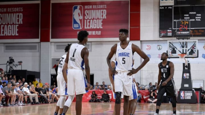 LAS VEGAS, NV - JULY 6: Jonathan Isaac #1 and Mohamed Bamba #5 of the Orlando Magic look on during the game against the Brooklyn Nets during the 2018 Las Vegas Summer League on July 6, 2018 at the Cox Pavilion in Las Vegas, Nevada. NOTE TO USER: User expressly acknowledges and agrees that, by downloading and/or using this photograph, user is consenting to the terms and conditions of the Getty Images License Agreement. Mandatory Copyright Notice: Copyright 2018 NBAE (Photo by David Dow/NBAE via Getty Images)
