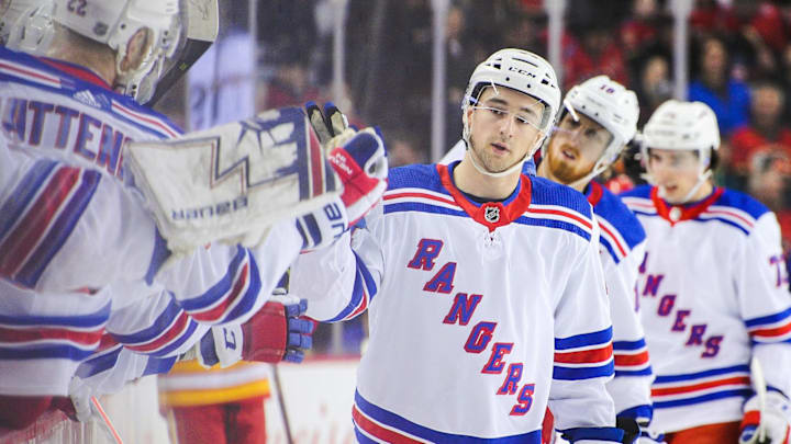 CALGARY, AB – MARCH 15: Neal Pionk #44 of the New York Rangers celebrates with the bench after scoring against the Calgary Flames during an NHL game at Scotiabank Saddledome on March 15, 2019 in Calgary, Alberta, Canada. (Photo by Derek Leung/Getty Images)