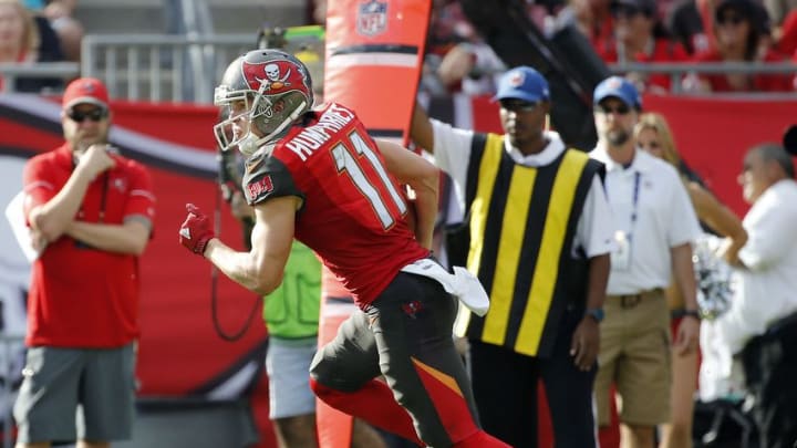 Jan 1, 2017; Tampa, FL, USA; Tampa Bay Buccaneers wide receiver Adam Humphries (11) runs with the ball against the Carolina Panthers during the second half at Raymond James Stadium. Tampa Bay Buccaneers defeated the Carolina Panthers 17-16. Mandatory Credit: Kim Klement-USA TODAY Sports