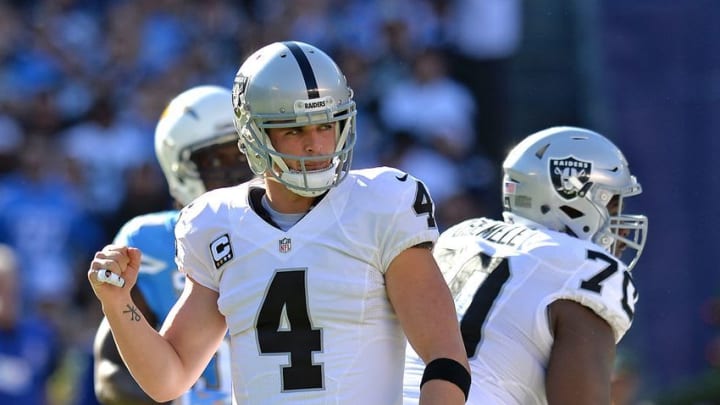 Dec 18, 2016; San Diego, CA, USA; Oakland Raiders quarterback Derek Carr (4) reacts during the first quarter against the San Diego Chargers at Qualcomm Stadium. Mandatory Credit: Jake Roth-USA TODAY Sports