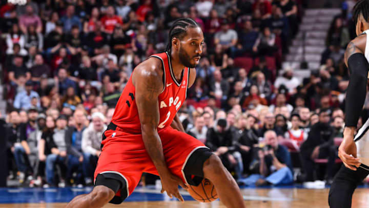 MONTREAL, QC - OCTOBER 10: Kawhi Leonard #2 of the Toronto Raptors dribbles the ball against the Brooklyn Nets during the pre-season NBA game at the Bell Centre on October 10, 2018 in Montreal, Quebec, Canada. The Toronto Raptors defeated the Brooklyn Nets 118-91. NOTE TO USER: User expressly acknowledges and agrees that, by downloading and or using this photograph, User is consenting to the terms and conditions of the Getty Images License Agreement. (Photo by Minas Panagiotakis/Getty Images)