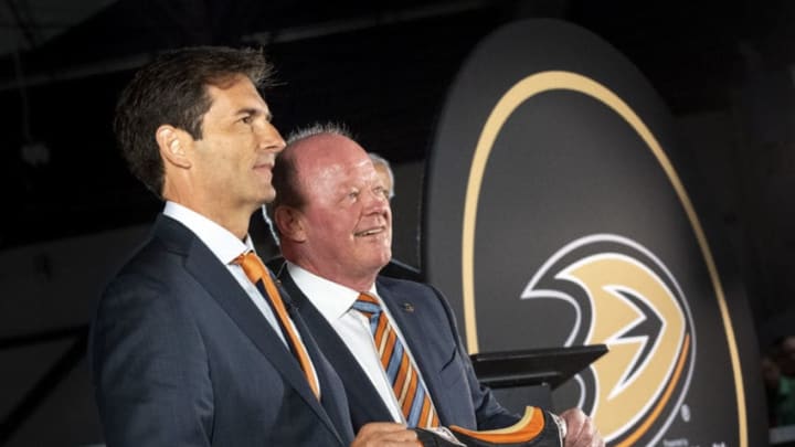 IRVINE, CA - JUNE 17: The new Anaheim Ducks Head Coach Dallas Eakins, left, was presented with a Ducks jersey by General Manager Bob Murray during a press conference at Great Park Ice in Irvine, CA on Monday, June 17, 2019. Eakins is the Ducks 10th head coach. He was most recently head coach at the San Diego Gulls of the American Hockey League (AHL). (Photo by Paul Bersebach/MediaNews Group/Orange County Register via Getty Images)