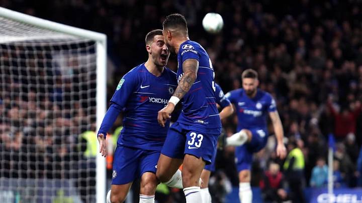 LONDON, ENGLAND - DECEMBER 19: Eden Hazard of Chelsea celebrates with teammate Emerson after scoring his team's first goal during the Carabao Cup Quarter Final match between Chelsea and AFC Bournemouth at Stamford Bridge on December 19, 2018 in London, United Kingdom. (Photo by Christopher Lee/Getty Images)