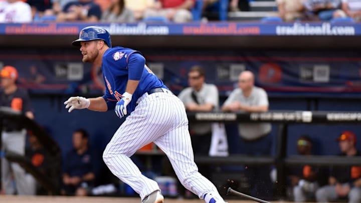 Mar 7, 2016; Port St. Lucie, FL, USA; New York Mets first baseman Lucas Duda (21) connects for a base hit during a spring training game against the Detroit Tigers at Tradition Field. Mandatory Credit: Steve Mitchell-USA TODAY Sports