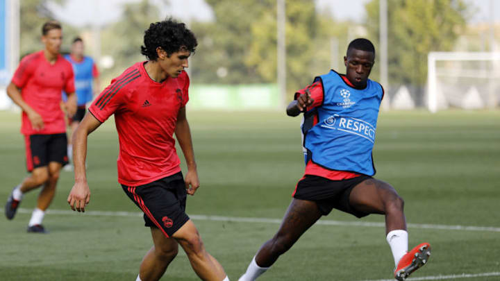 MADRID, SPAIN - SEPTEMBER 18: Jesus Vallejo (L) and Vinicius Jr of Real Madrid in action during a training session at Valdebebas training ground on September 18, 2018 in Madrid, Spain. (Photo by Angel Martinez/Real Madrid via Getty Images)