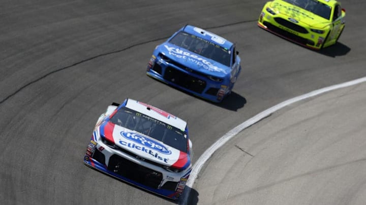 JOLIET, IL - JULY 01: AJ Allmendinger, driver of the #47 Kroger ClickList Chevrolet, leads Chris Buescher, driver of the #37 Kleenex Wet Wipes Chevrolet, and Paul Menard, driver of the #21 Menards/Sylvania Ford, during the Monster Energy NASCAR Cup Series Overton's 400 at Chicagoland Speedway on July 1, 2018 in Joliet, Illinois. (Photo by Matt Sullivan/Getty Images)