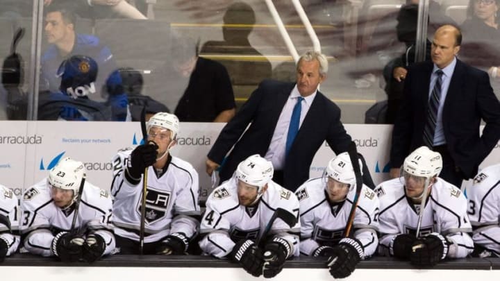 Oct 12, 2016; San Jose, CA, USA; Los Angeles Kings head coach Darryl Sutter watches the game against the San Jose Sharks in the second period at SAP Center at San Jose. Mandatory Credit: John Hefti-USA TODAY Sports